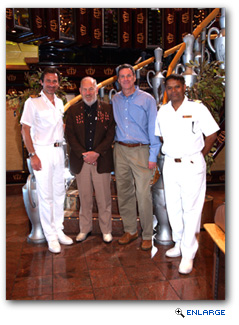 Filomena (second from left) is pictured here during his most recent cruise on the Carnival Legend with the ship's Captain Vincenzo Alcaras and Hotel Director Guna Chellam (far left and far right, respectively) and Carnival President and CEO Gerry Cahill.