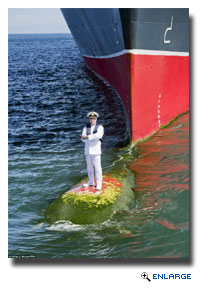 QM2 Captain Stands On Bulbous Bow